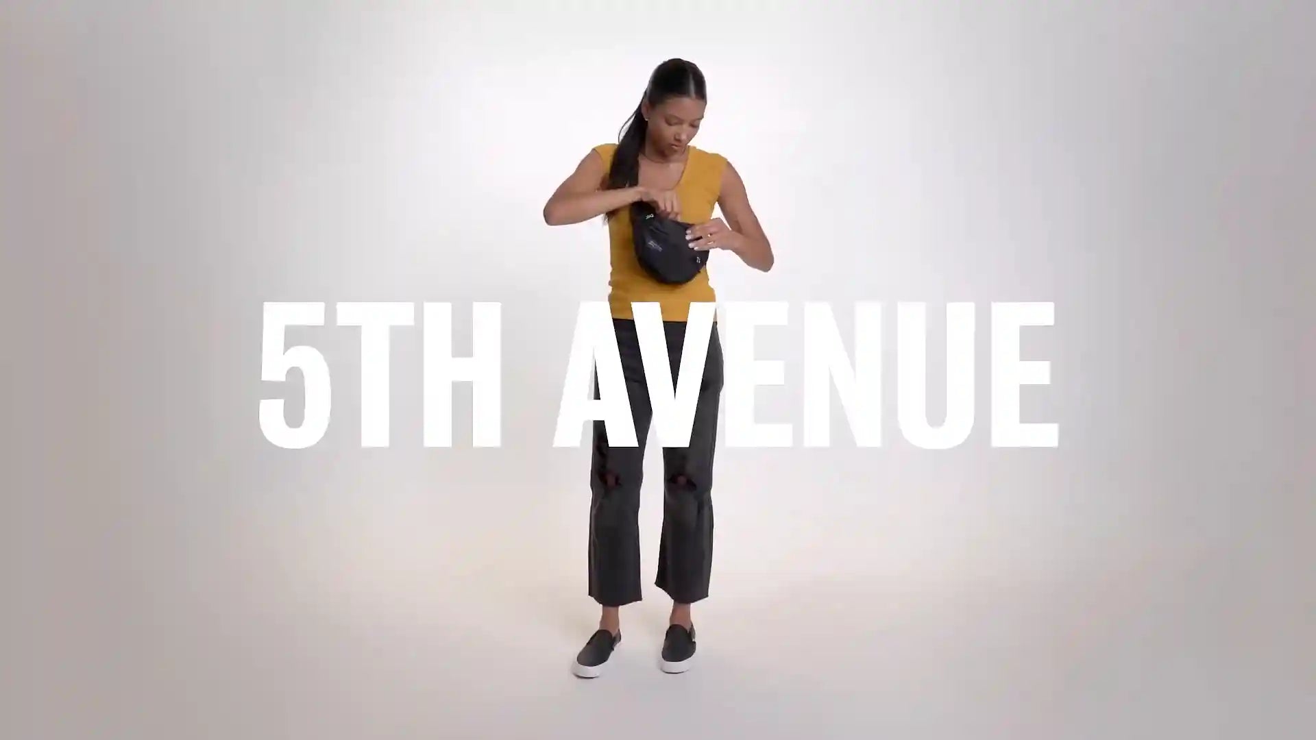 Fanny Pack features being shown by a young lady